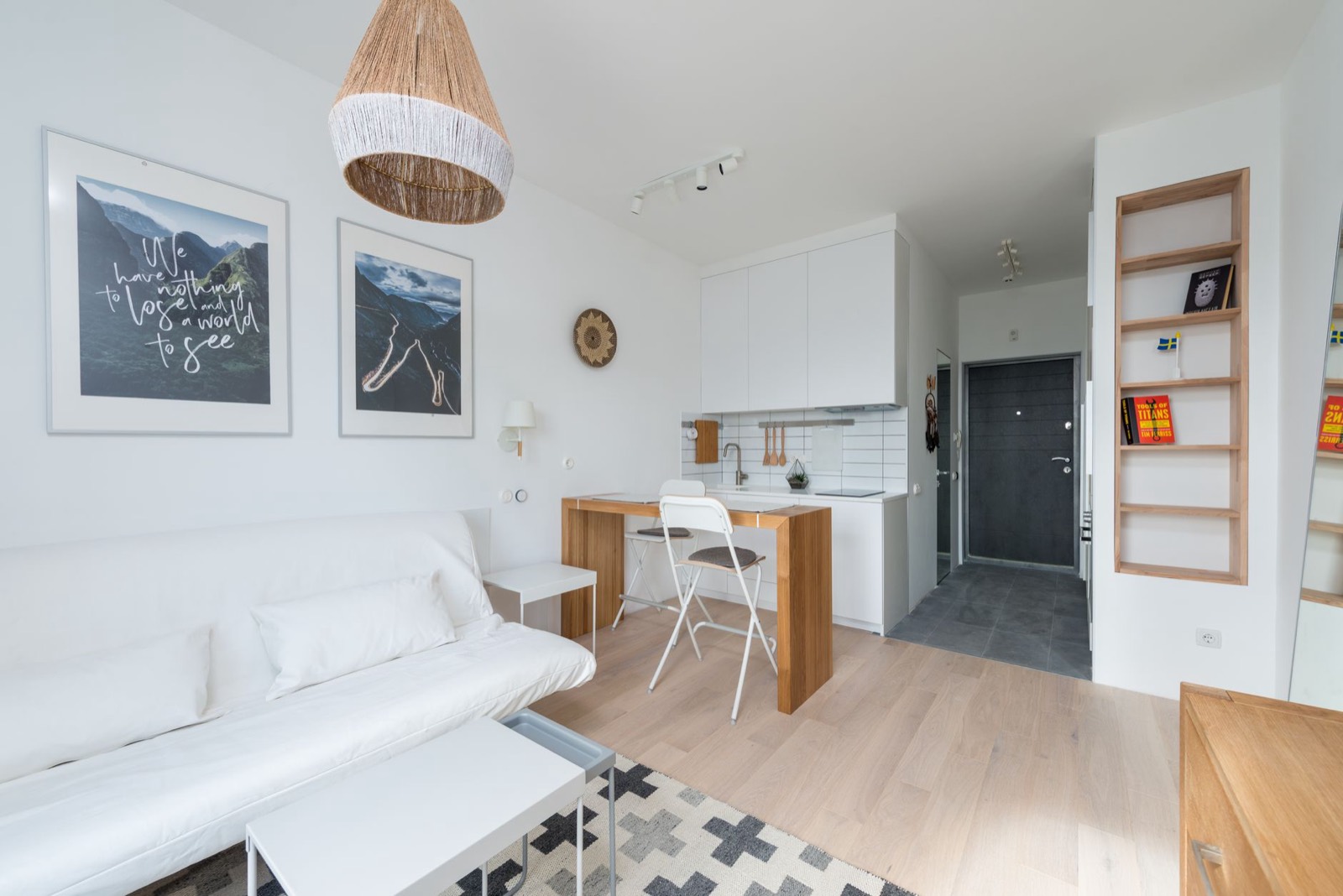 Compact sofa in a small apartment living room sized to leave walking space