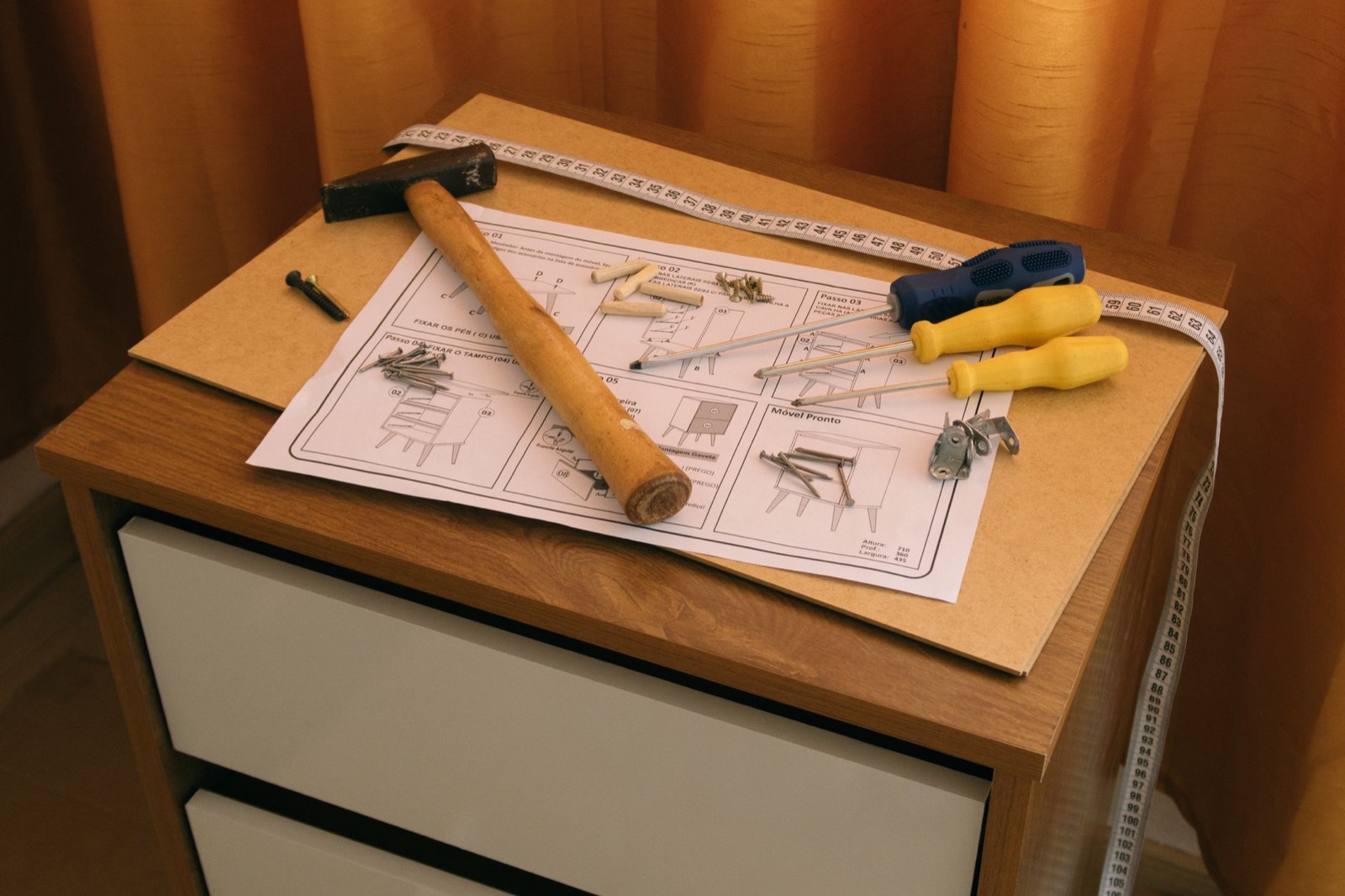 Tools and fixings used to assemble a bunk bed frame securely