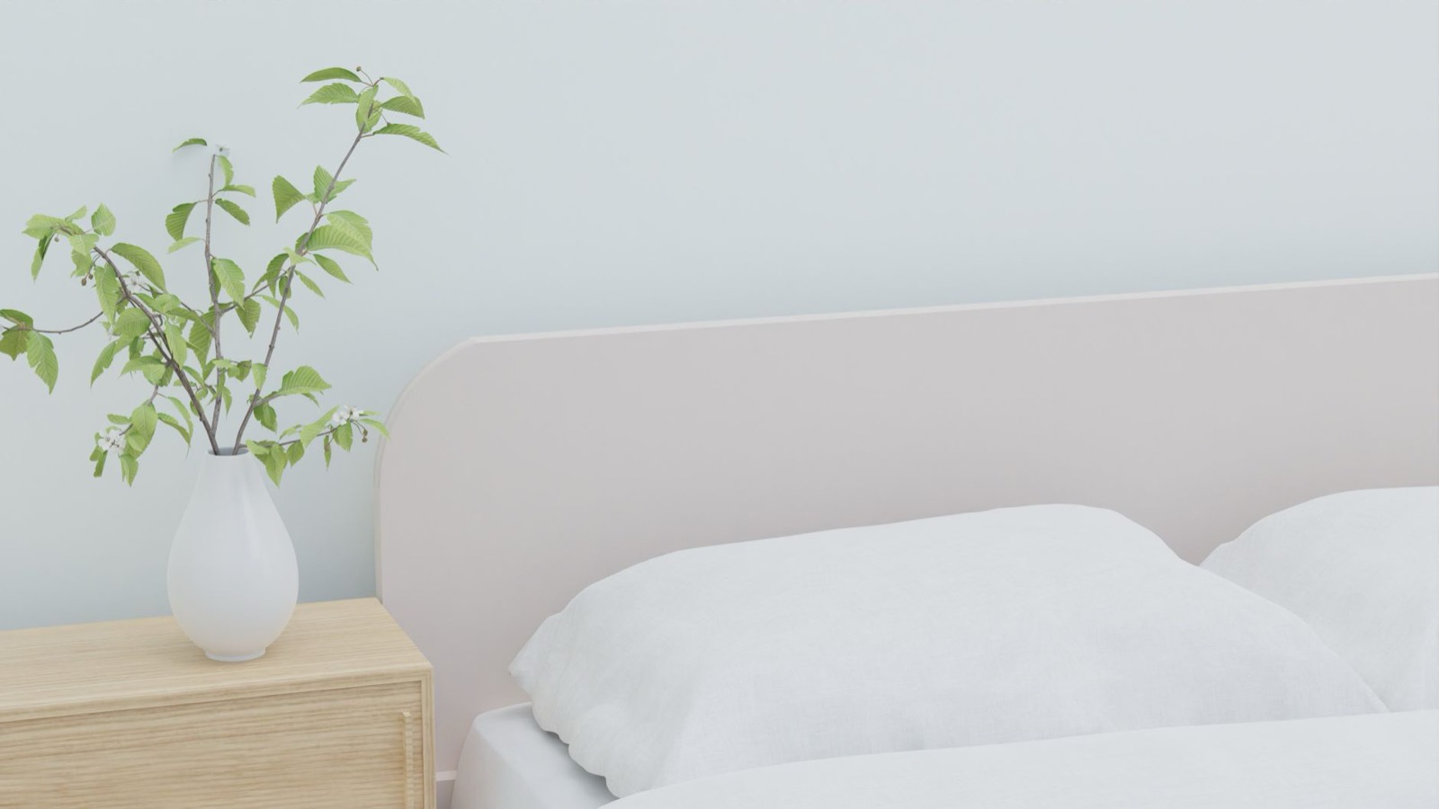 Low-profile platform bed with a mattress sitting on a flat, solid support surface