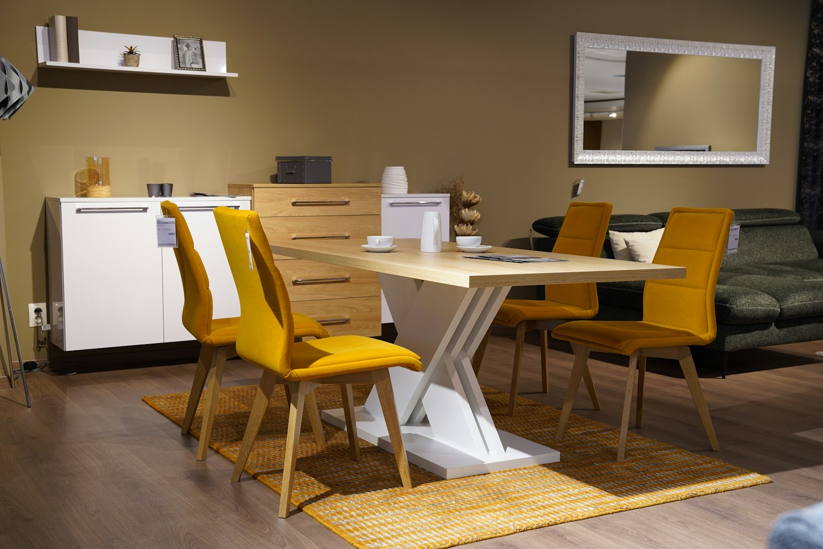 Dining sets on display in a furniture showroom where chair clearance can be checked
