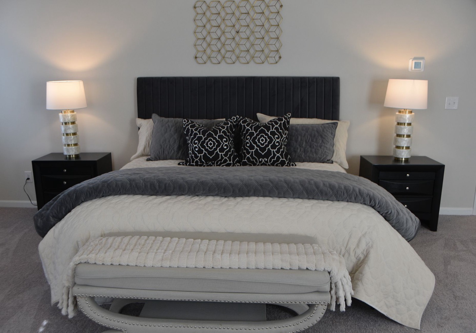 Complete bedroom setup with mattress and frame showing how support underneath affects durability