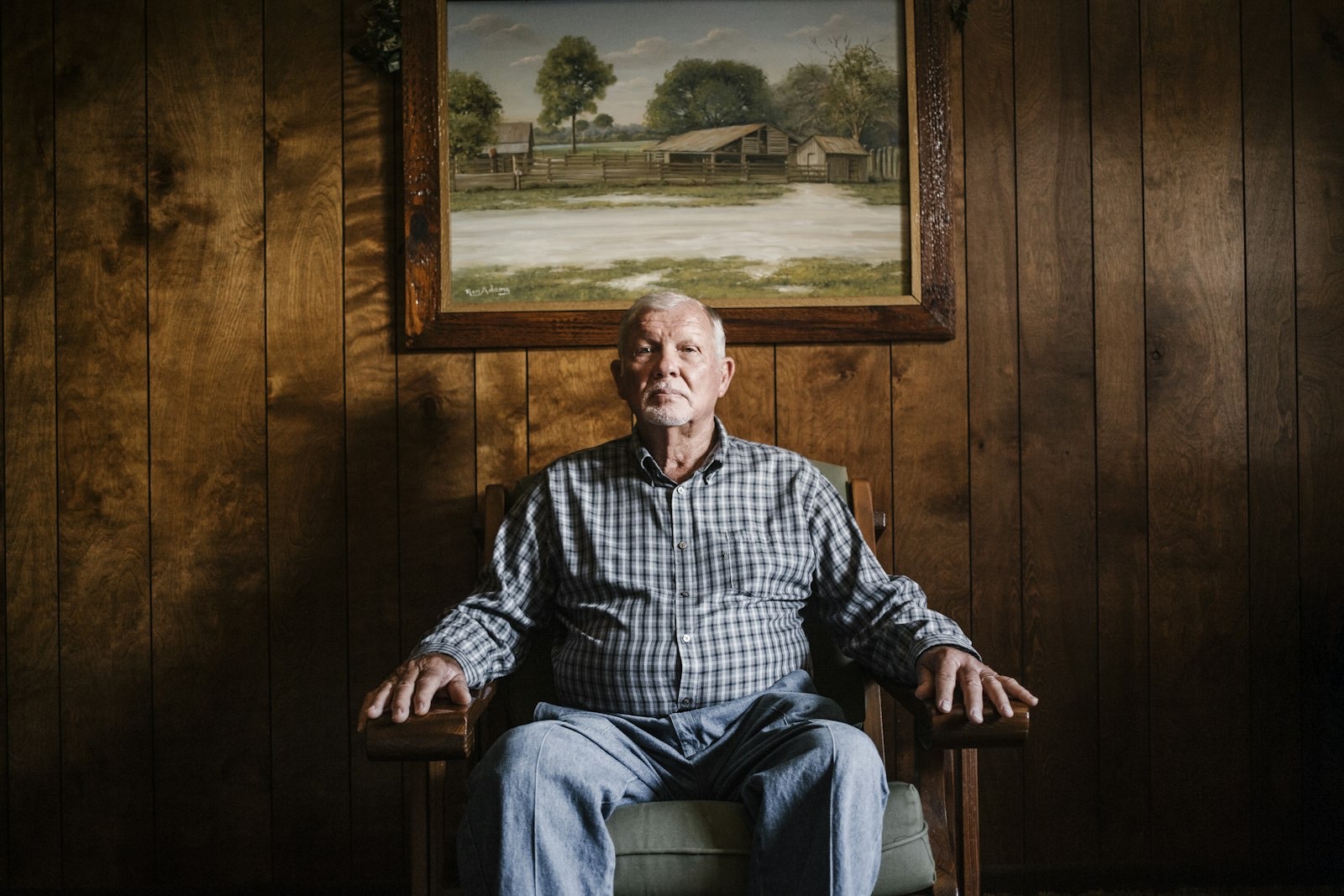 Older adult seated in a supportive armchair, the use case for a power lift recliner