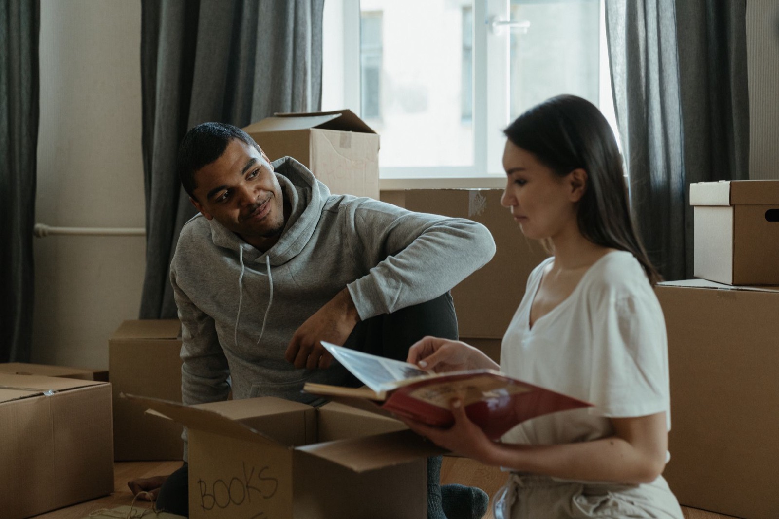 Moving boxes in a new home, a common situation for military families relocating to Hampton Roads