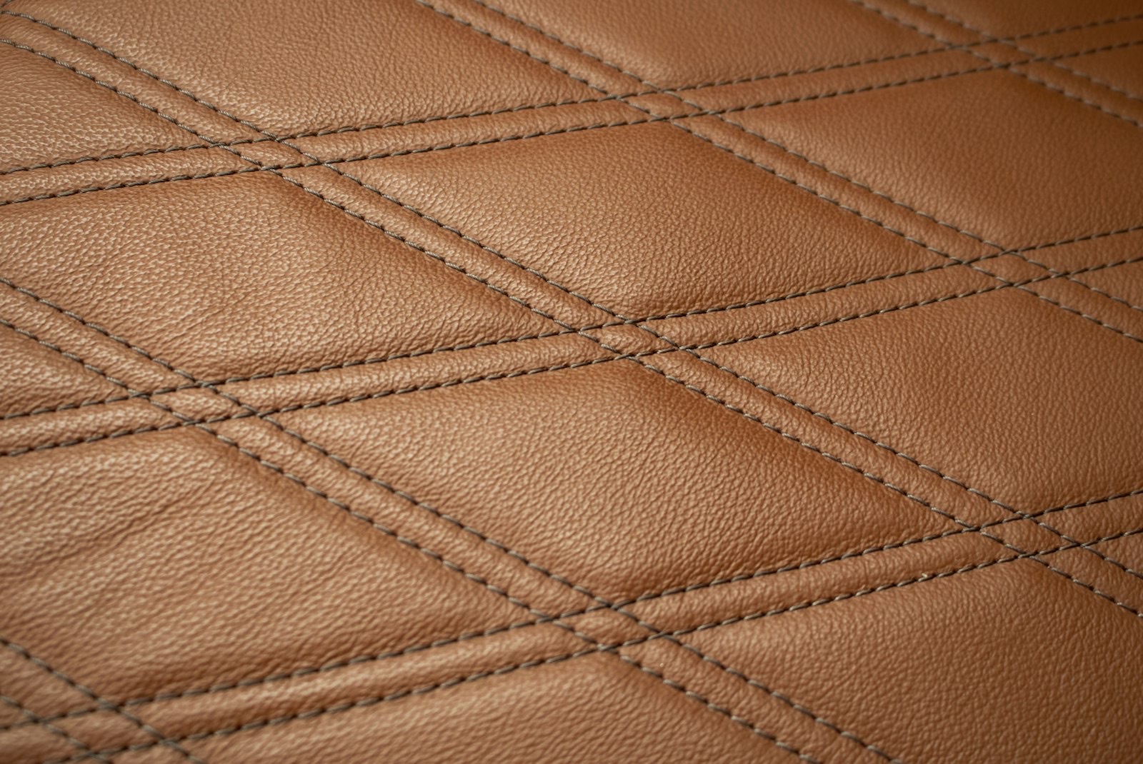 Close-up of recliner upholstery and seat construction used to judge fit and quality