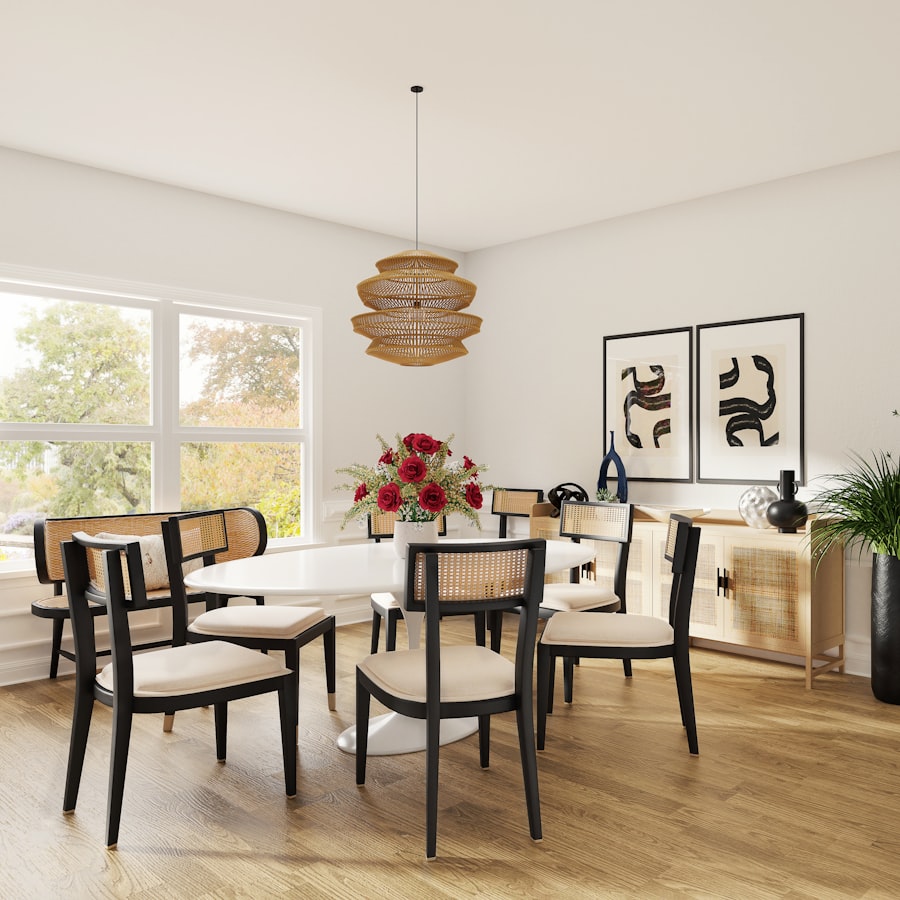 Dining room with round table, upholstered chairs and sideboard