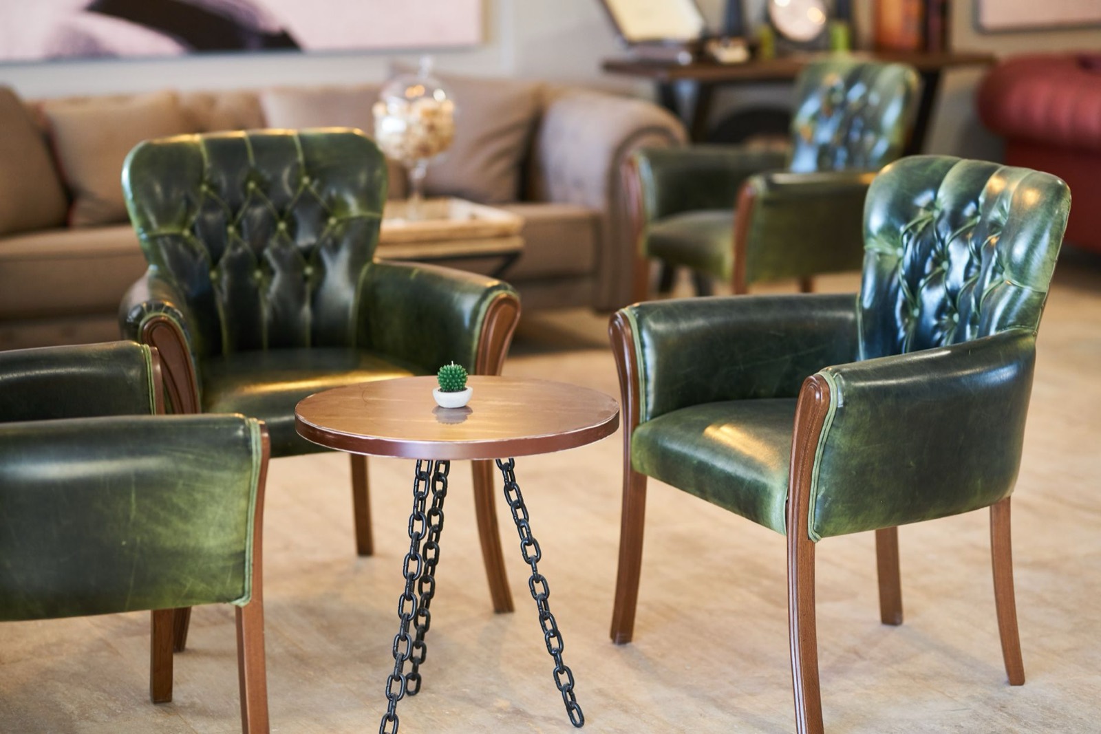 Coffee table placed in front of a sofa at a comfortable clearance for legroom and walking past